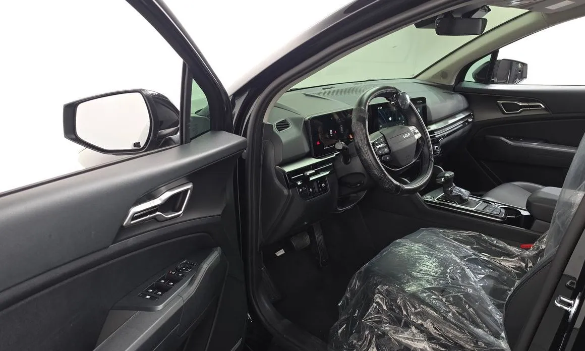 Kia Sportage — фото 9