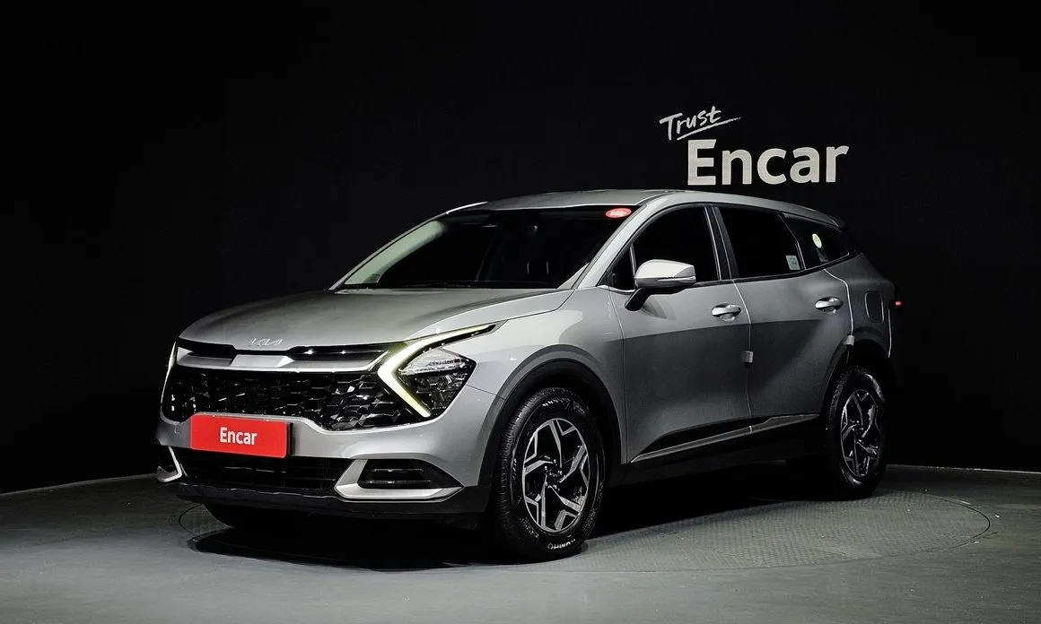 Kia Sportage — фото 1
