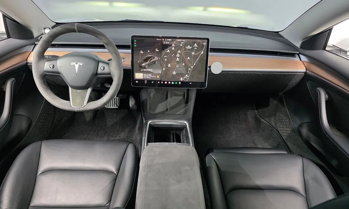 Tesla Model 3 — фото 9