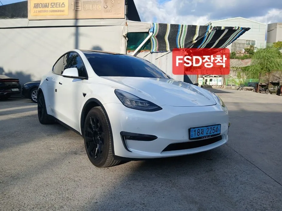 Tesla Model Y — фото 7