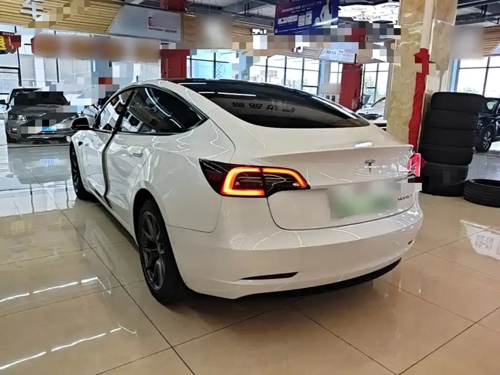 Tesla Model 3 — фото 5