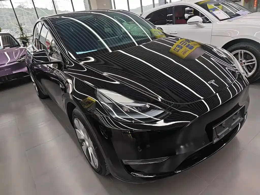 Tesla Model Y — фото 9