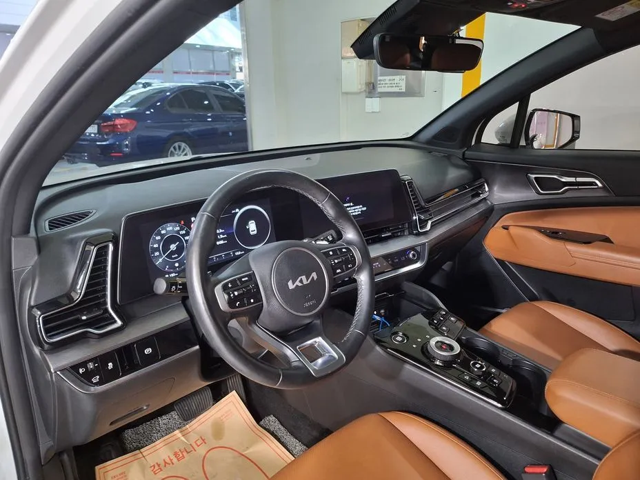 Kia Sportage — фото 7