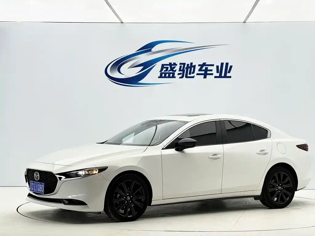Mazda 3 Axela — фото 1