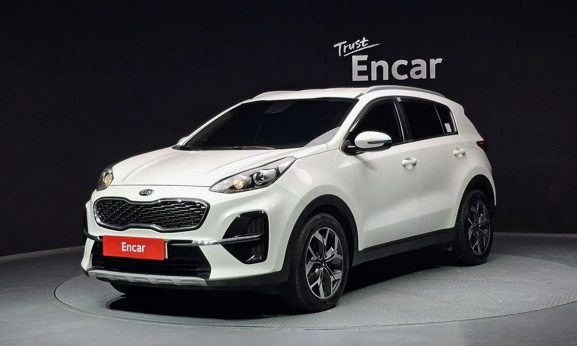 Kia Sportage — фото 1