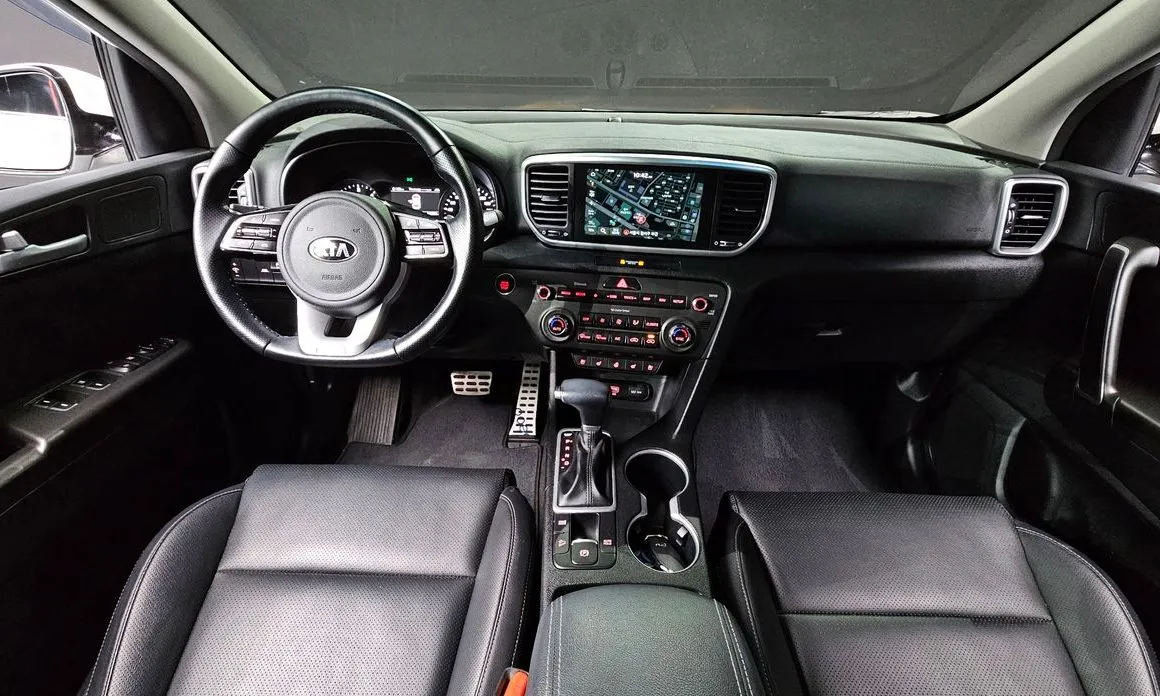 Kia Sportage — фото 10