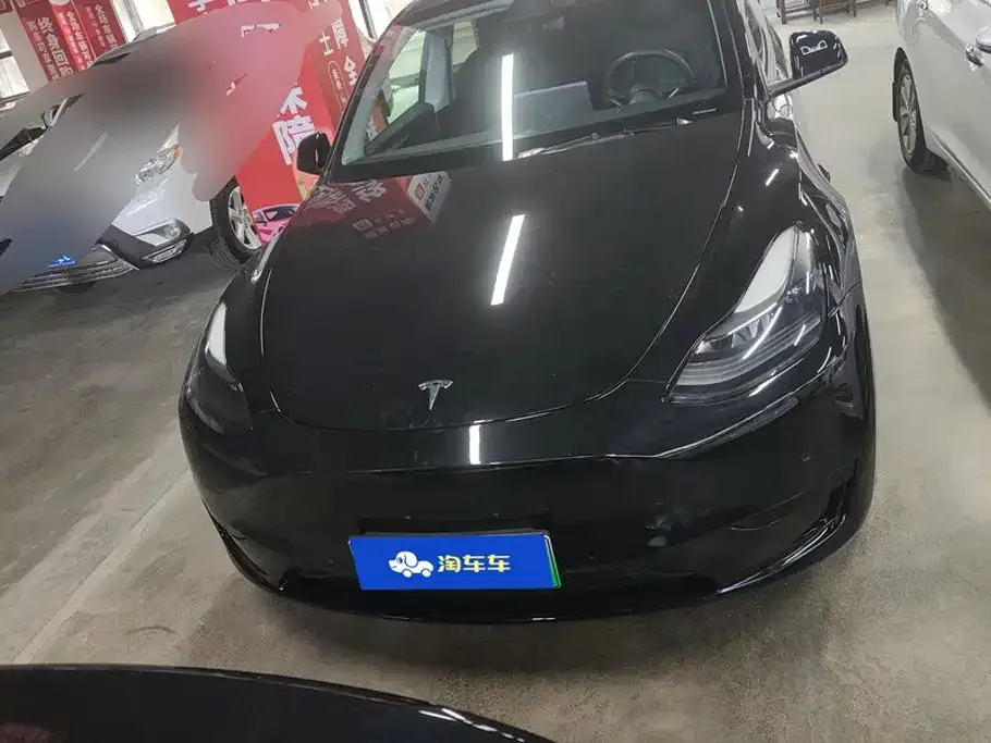 Tesla Model Y — фото 5