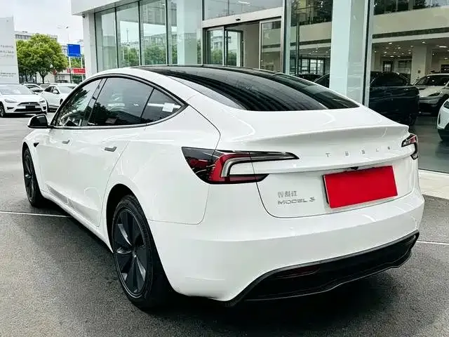 Tesla Model 3 — фото 7
