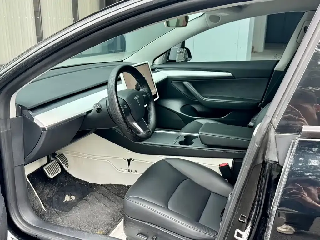 Tesla Model 3 — фото 6