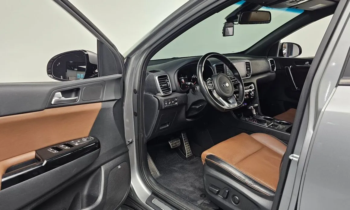 Kia Sportage — фото 8