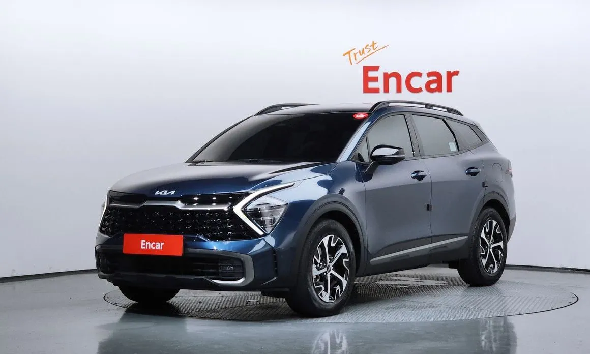 Kia Sportage — фото 1