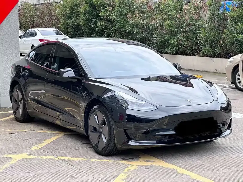 Tesla Model 3 — фото 10