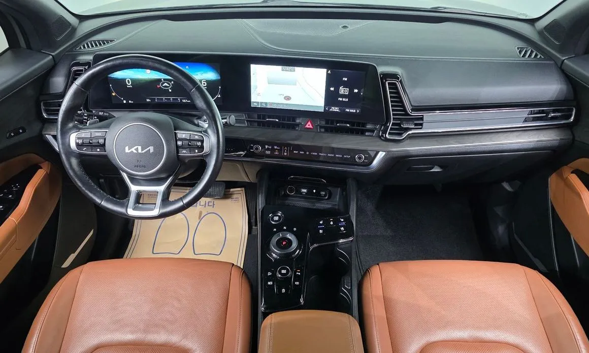 Kia Sportage — фото 9