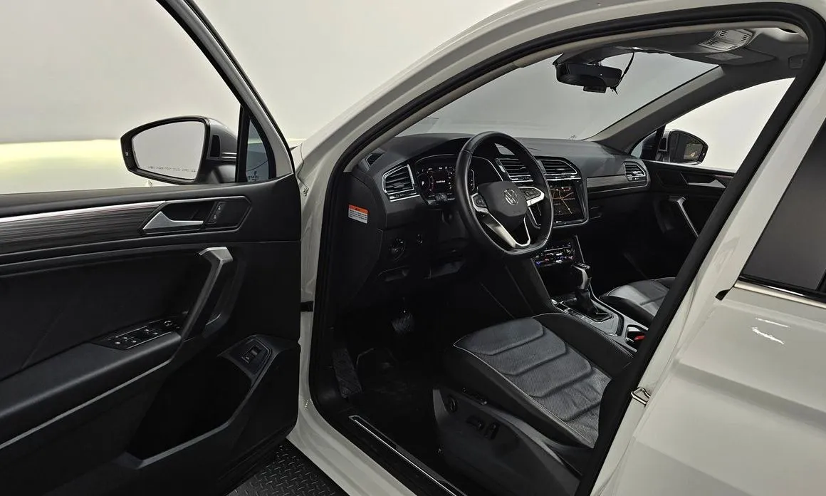Volkswagen Tiguan — фото 7