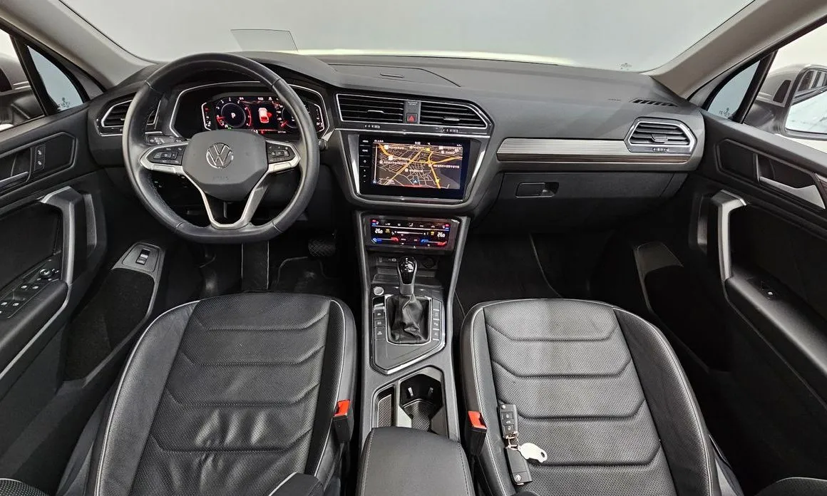 Volkswagen Tiguan — фото 6