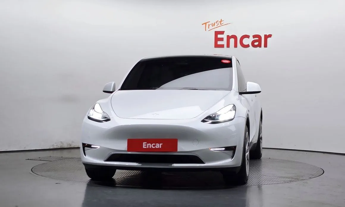 Tesla Model Y — фото 10