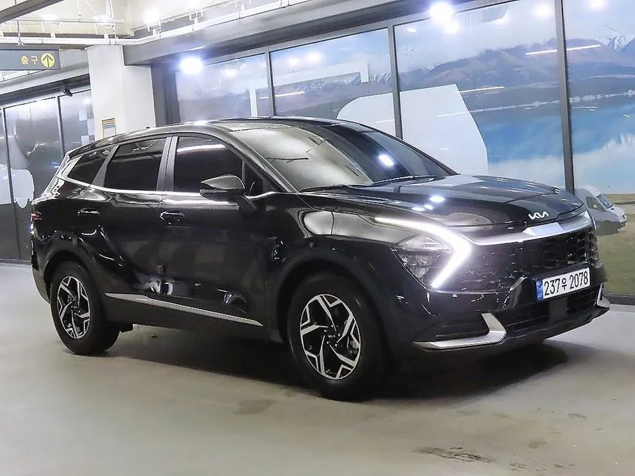 Kia Sportage — фото 1