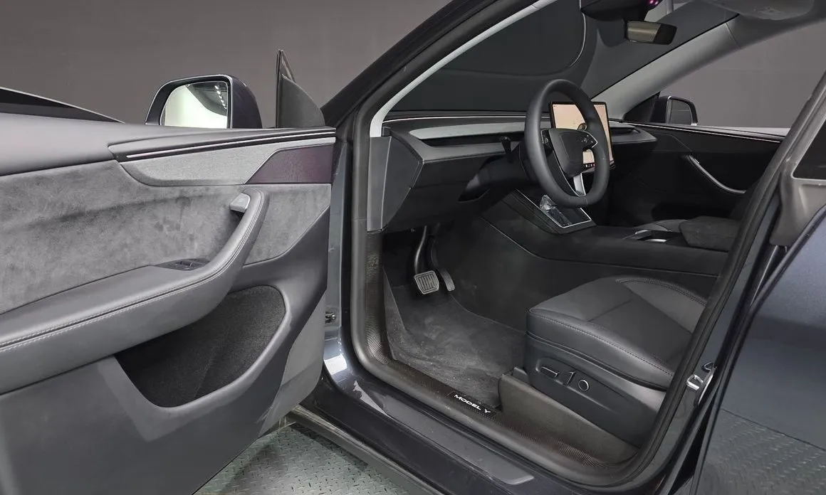 Tesla Model Y — фото 10