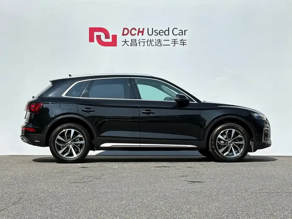 Audi Q5L — фото 10