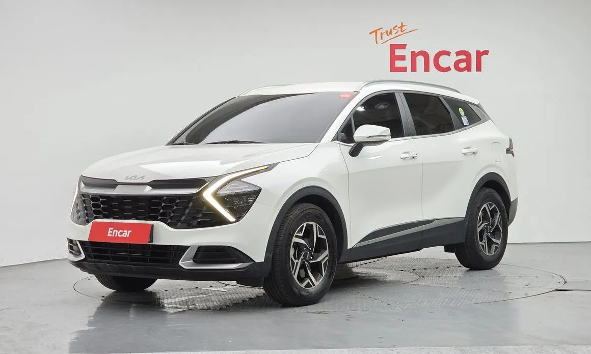 Kia Sportage — фото 1