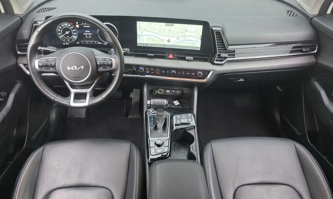 Kia Sportage — фото 9