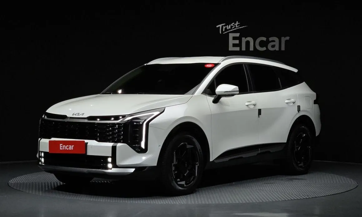 Kia Sportage — фото 1