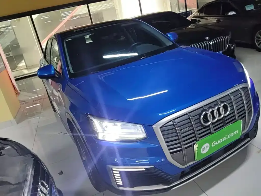 Audi Q2L e-tron — фото 4