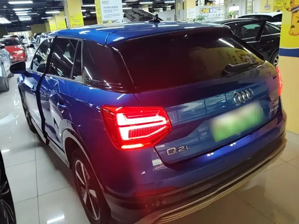 Audi Q2L e-tron — фото 10