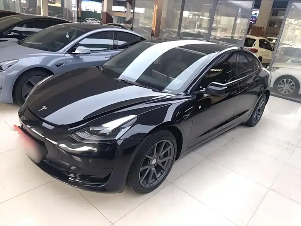 Tesla Model 3 — фото 9