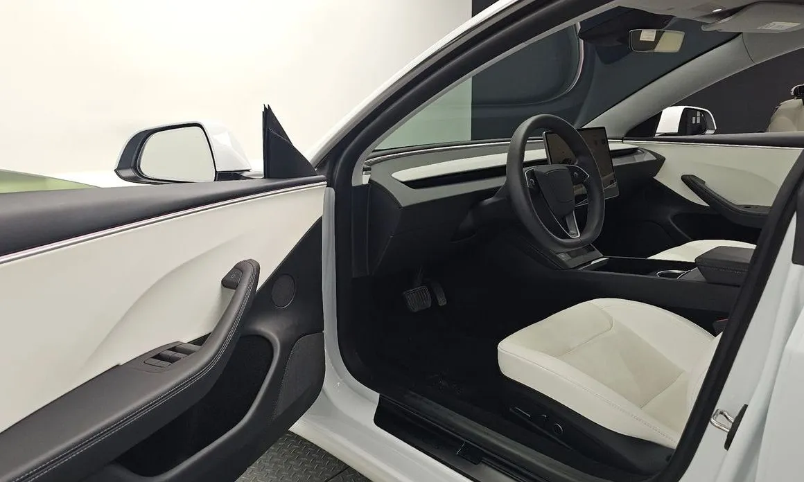 Tesla Model 3 — фото 7