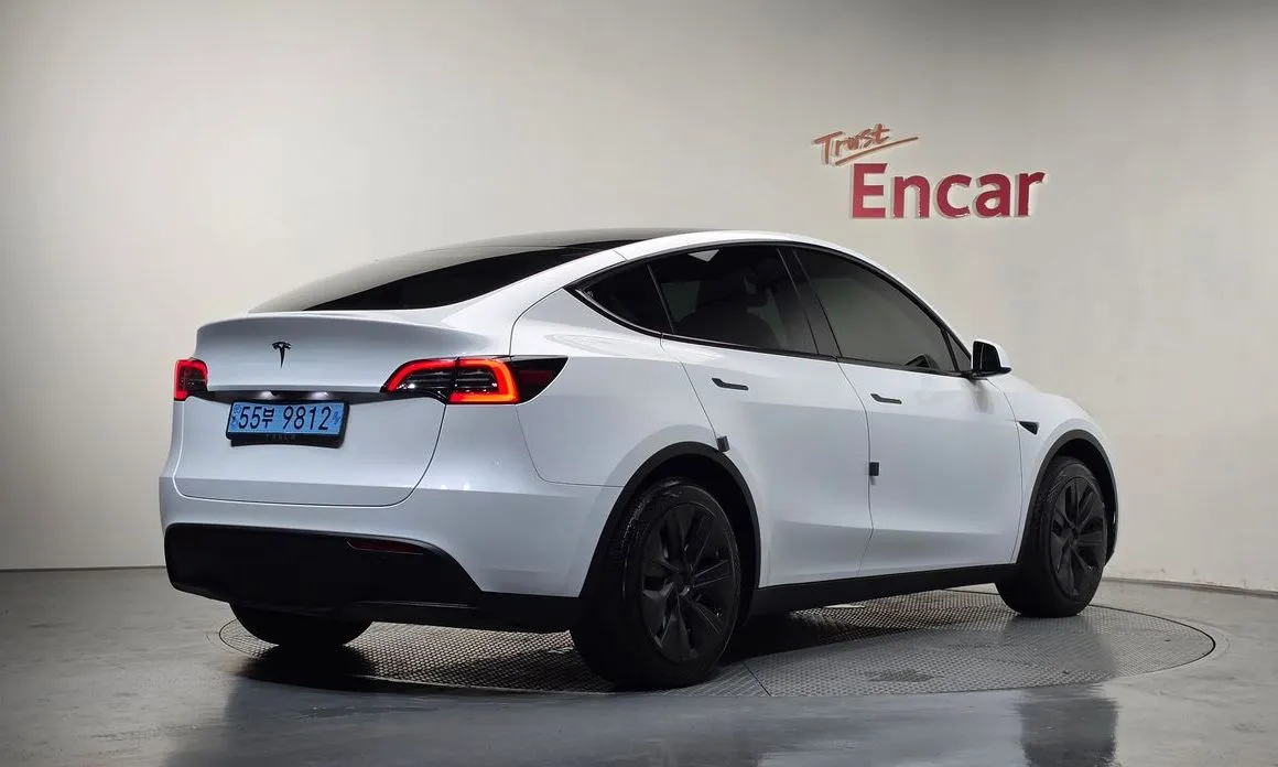 Tesla Model Y — фото 6
