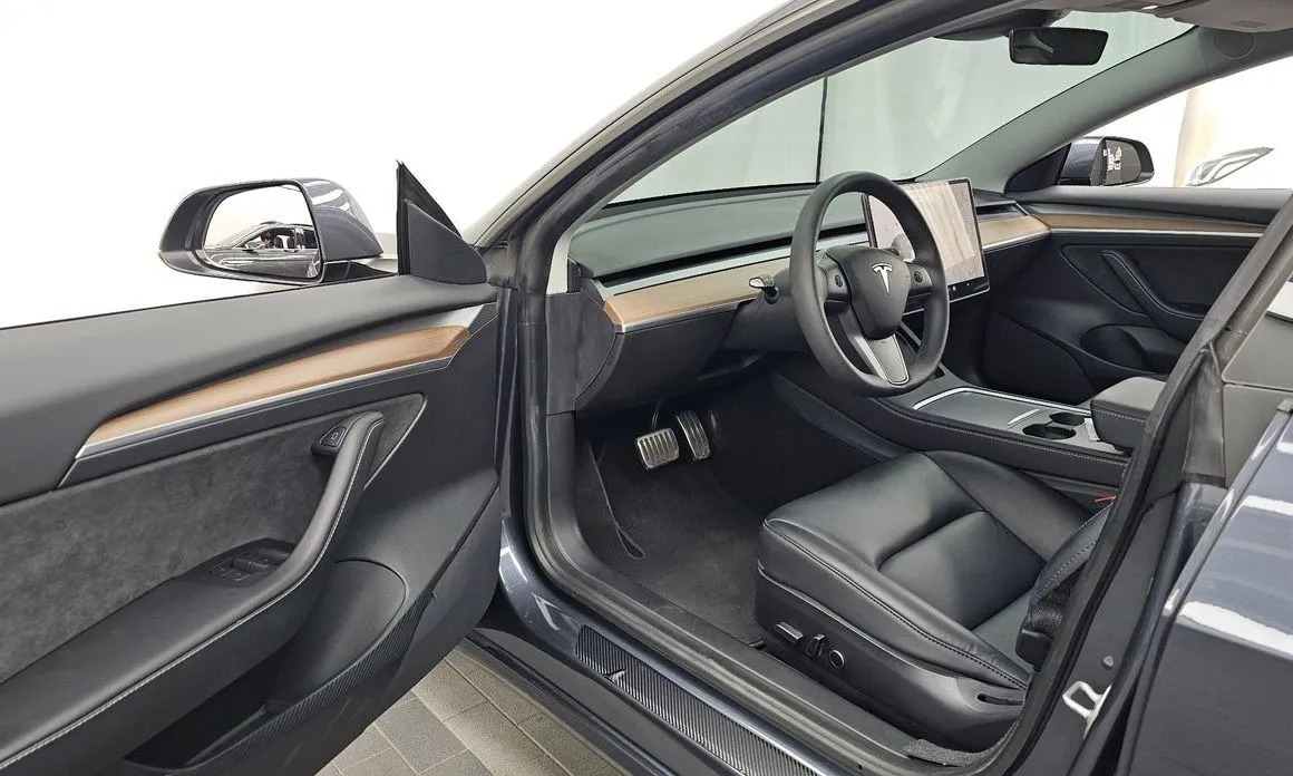 Tesla Model 3 — фото 10