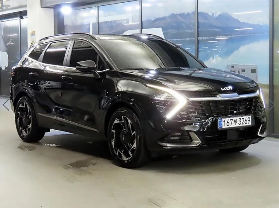 Kia Sportage — фото 1