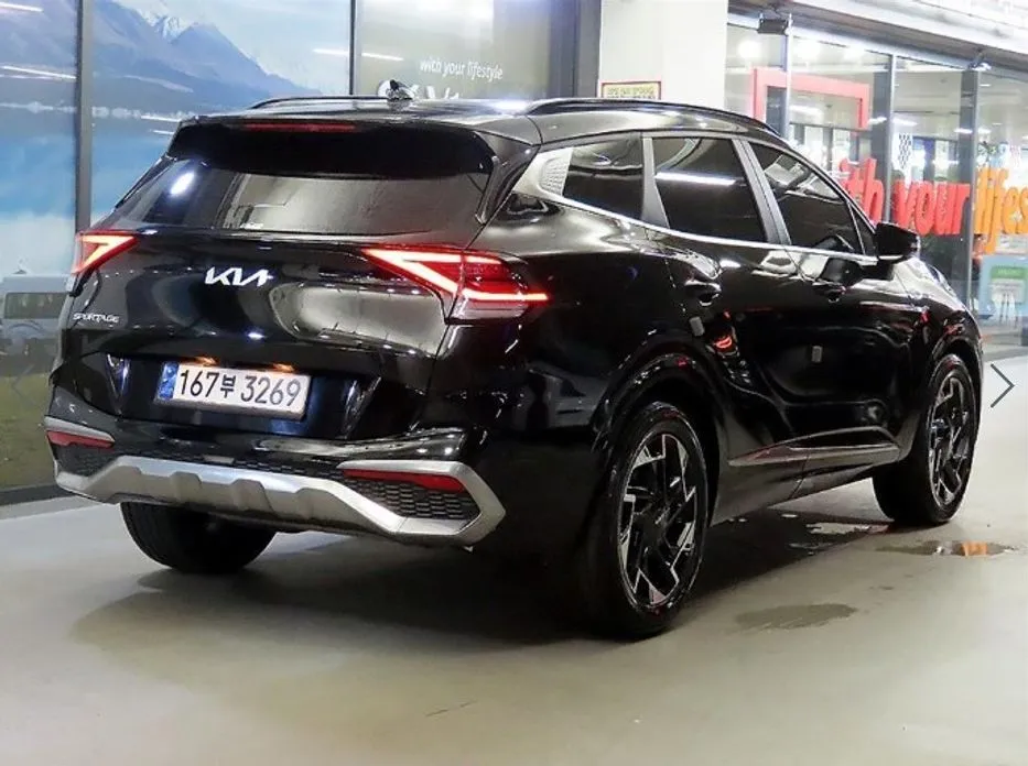 Kia Sportage — фото 6
