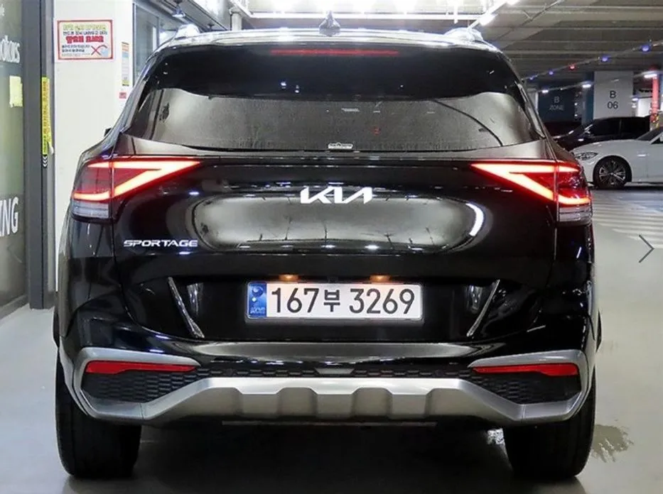 Kia Sportage — фото 10