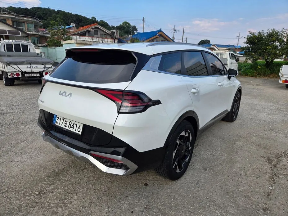 Kia Sportage — фото 10