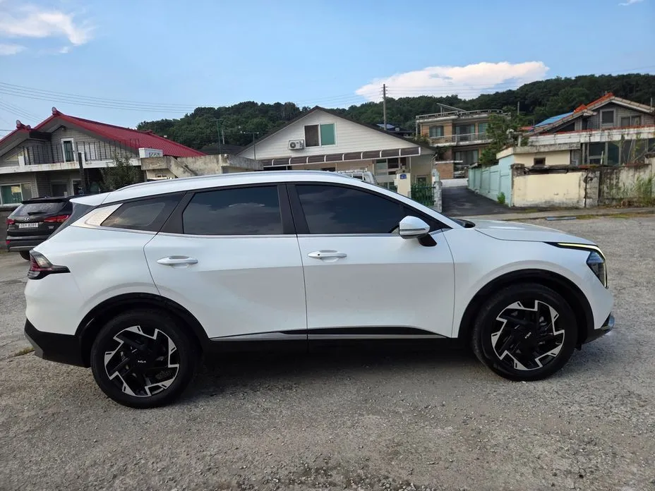 Kia Sportage — фото 7