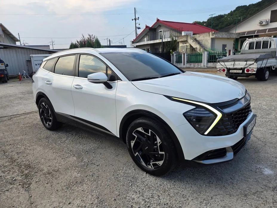 Kia Sportage — фото 8