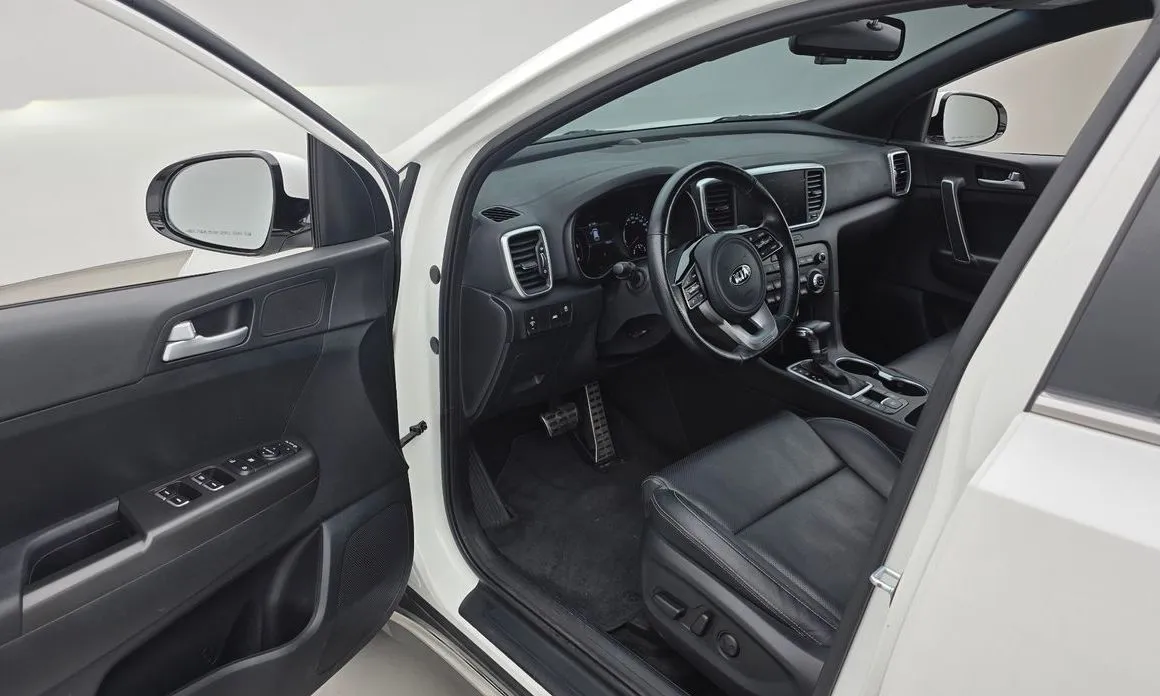 Kia Sportage — фото 7