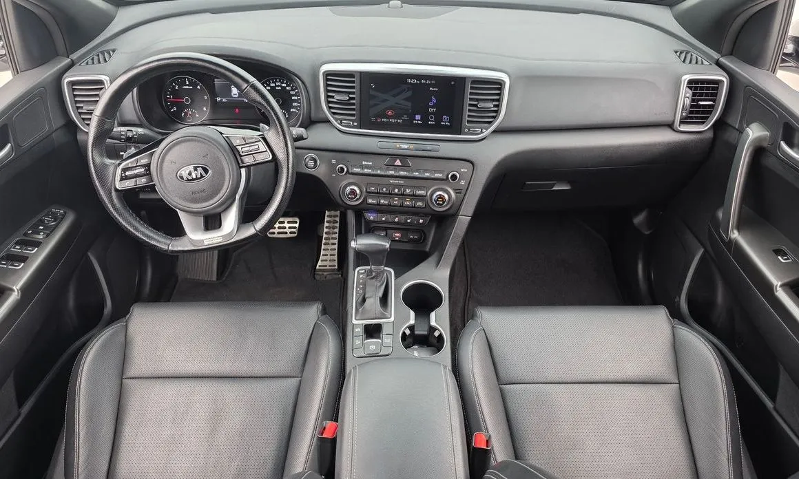 Kia Sportage — фото 8