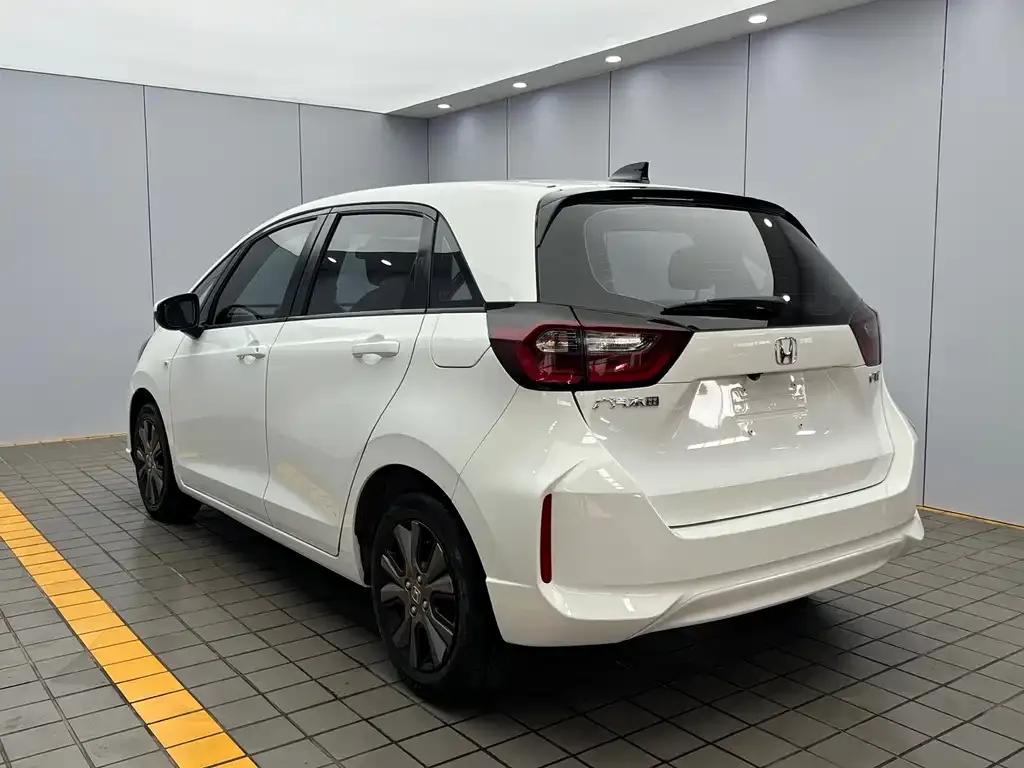 Honda Fit — фото 7