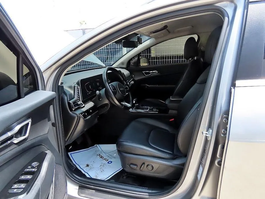Kia Sportage — фото 7