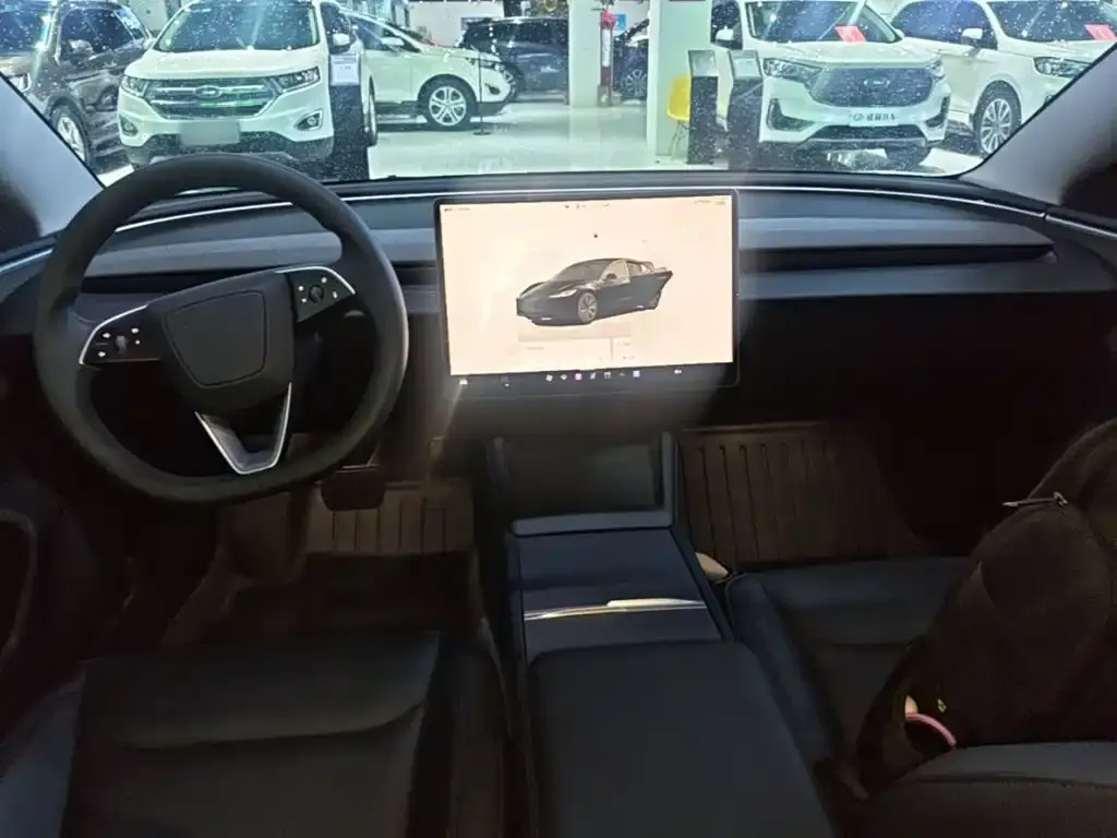 Tesla Model 3 — фото 9