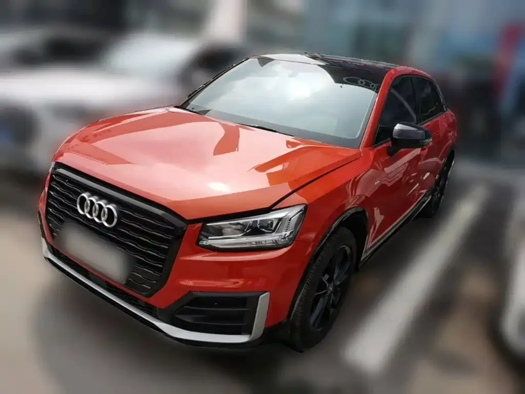 Audi Q2L — фото 7