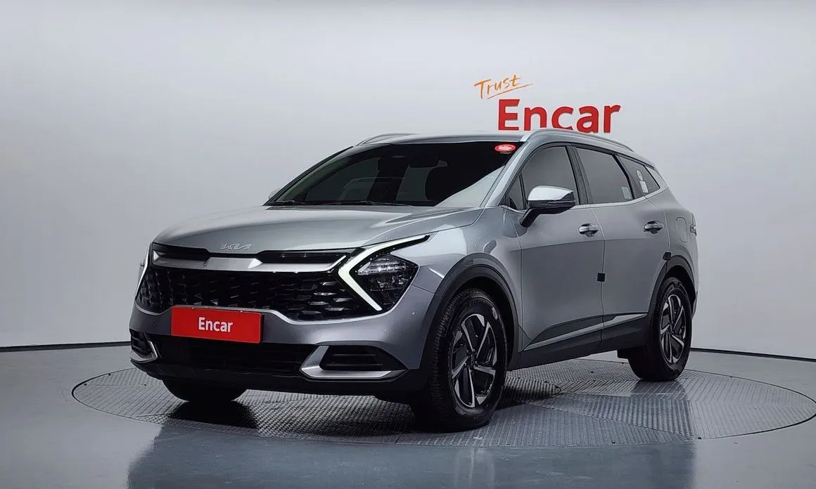 Kia Sportage — фото 1
