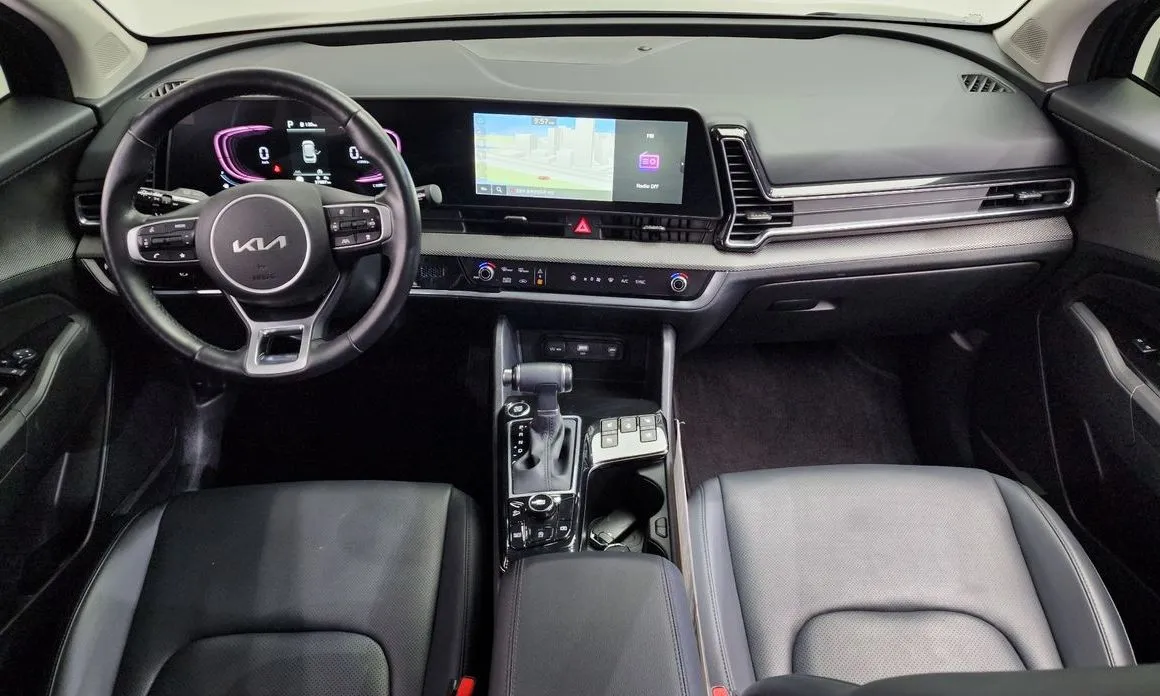 Kia Sportage — фото 8