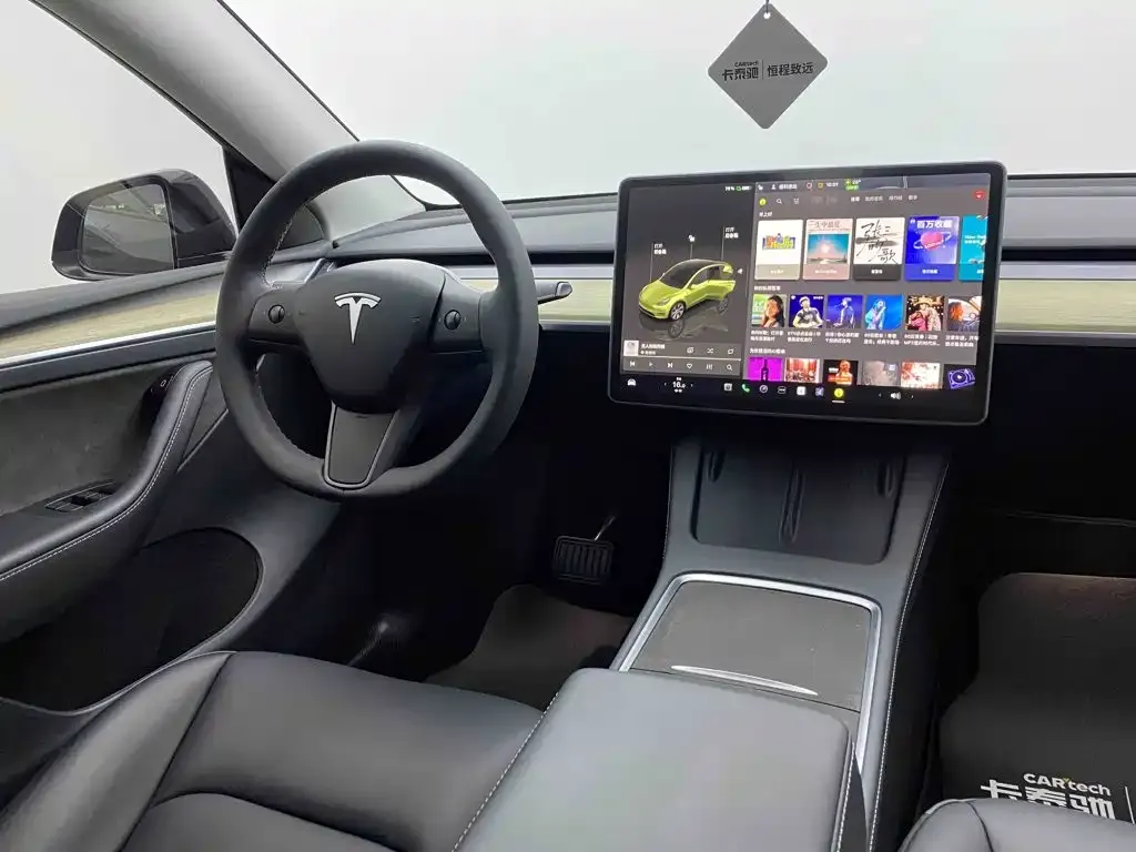 Tesla Model Y — фото 9