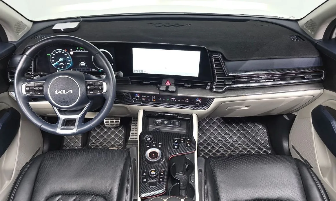 Kia Sportage — фото 10