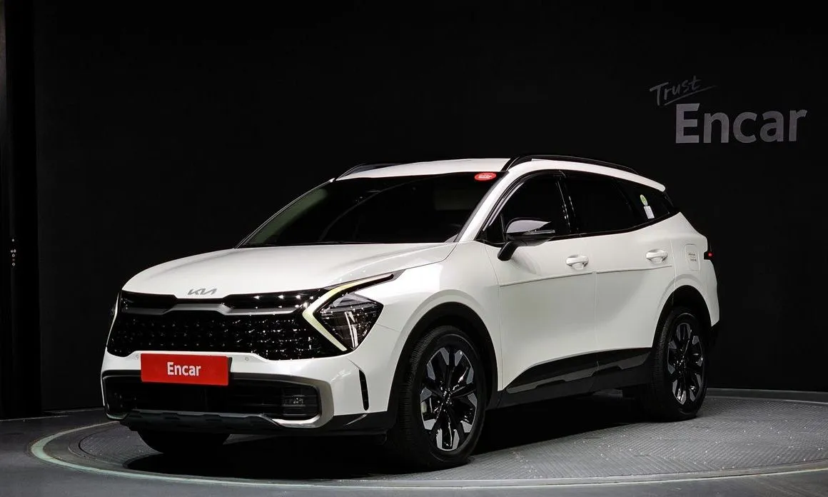 Kia Sportage — фото 1
