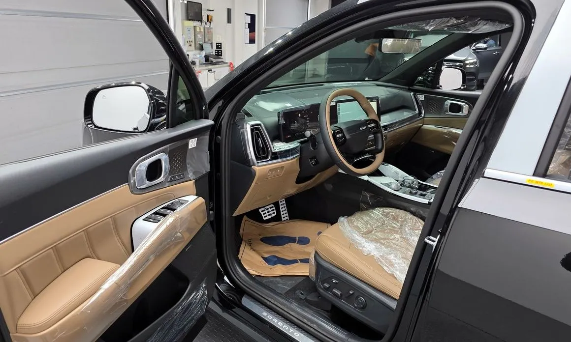 Kia Sorento — фото 7